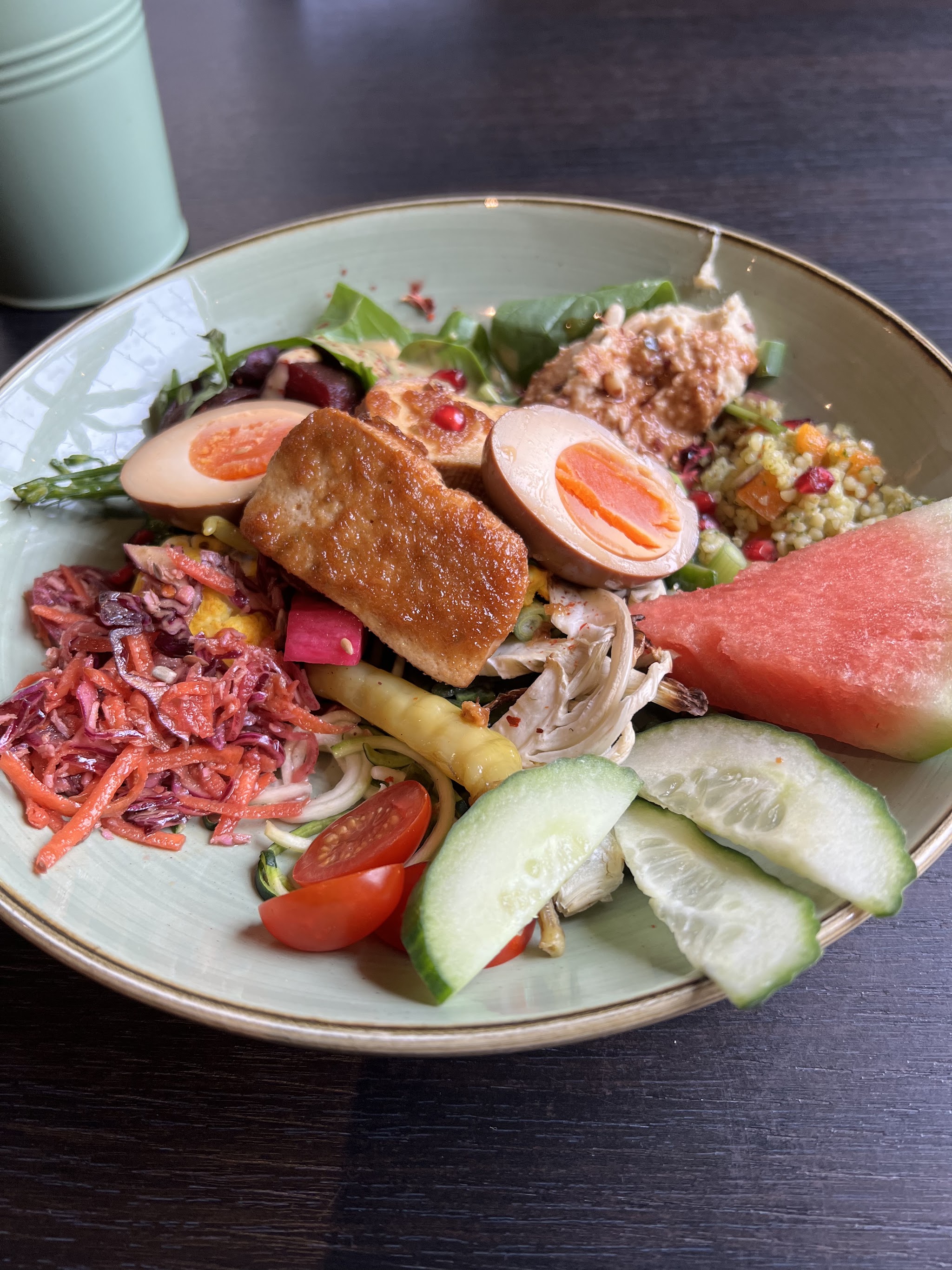 A colourful River Cafe bowl with vegetables, egg and fresh salad