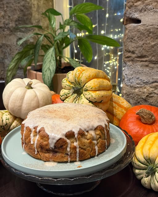 An iced cake with autumn squash and pumpkins at River Cafe
